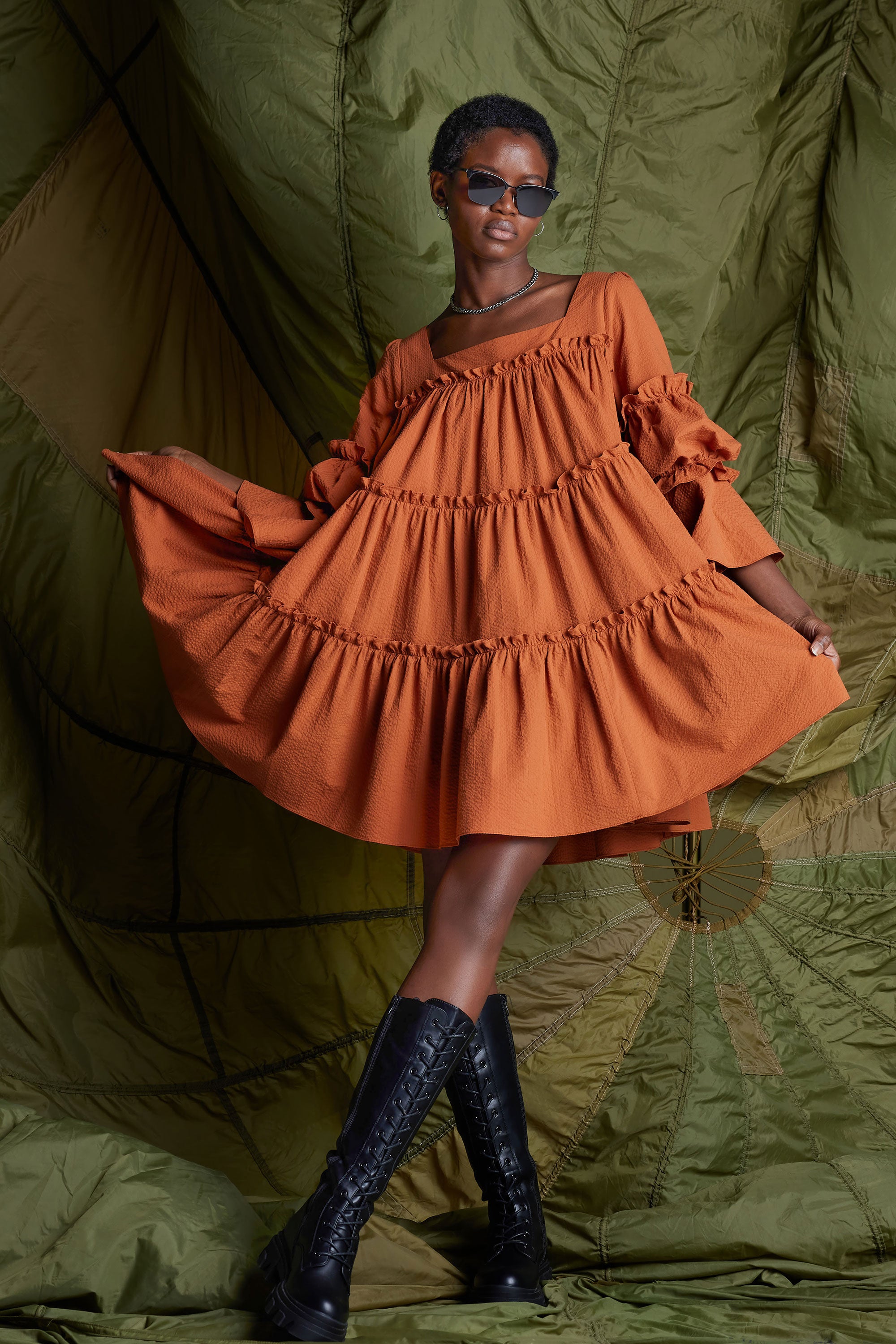 Shop Our Bold Burnt Orange Splash Mini Dress at Nish Niche Shop Our Bold Burnt Orange Splash Mini Dress at Nish Niche