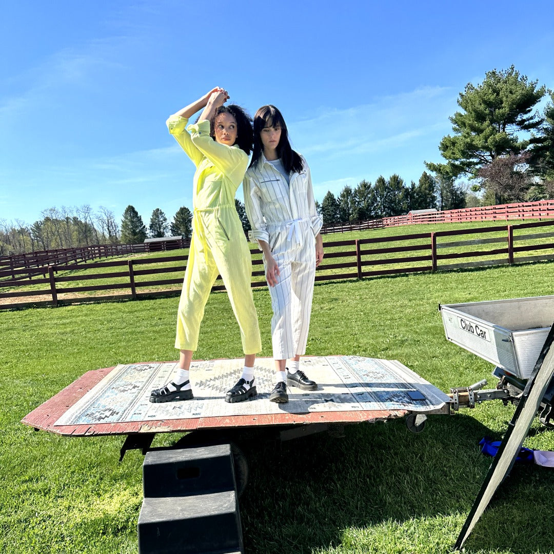 Nish Niche yellow and white-striped jumpsuits from the Sky Collection