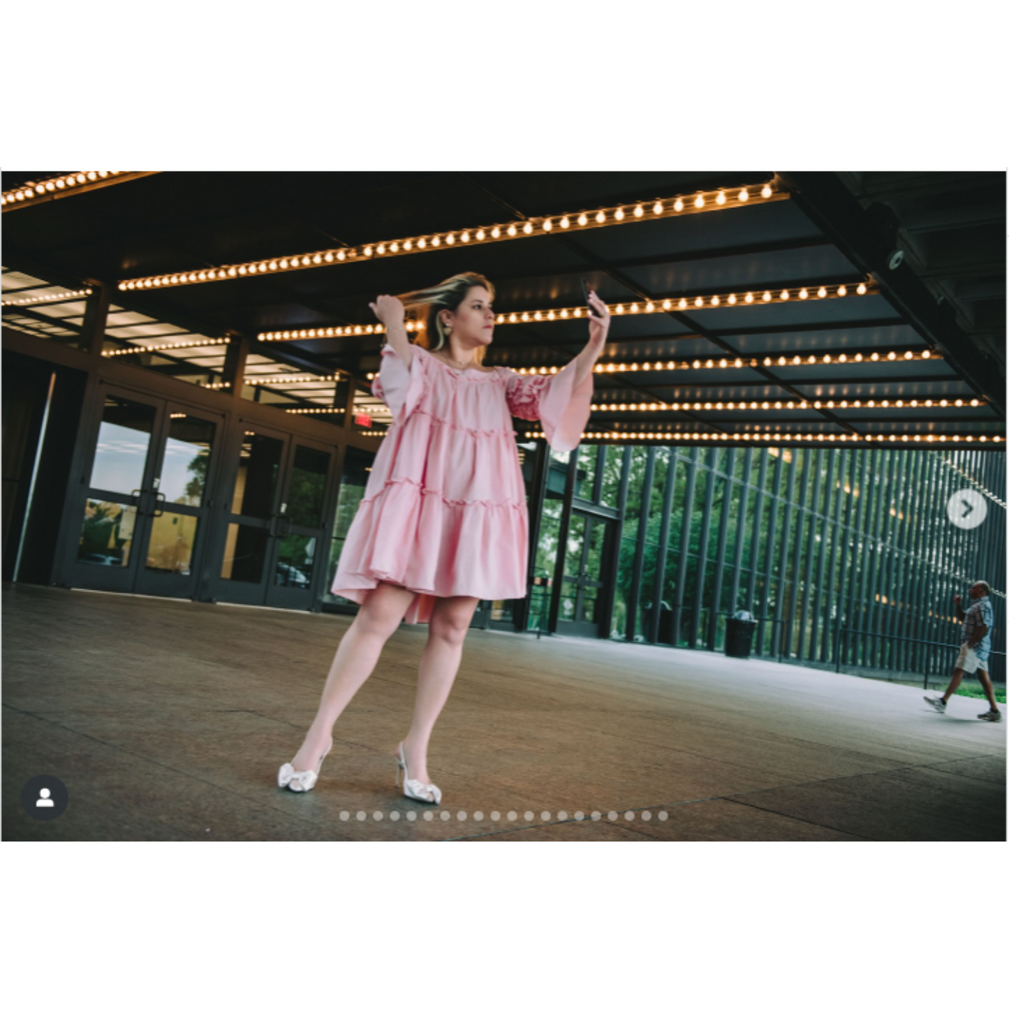 Es La Tata models Nish Niche Pink Splash Dress from the See Sea collection at Bell Works
