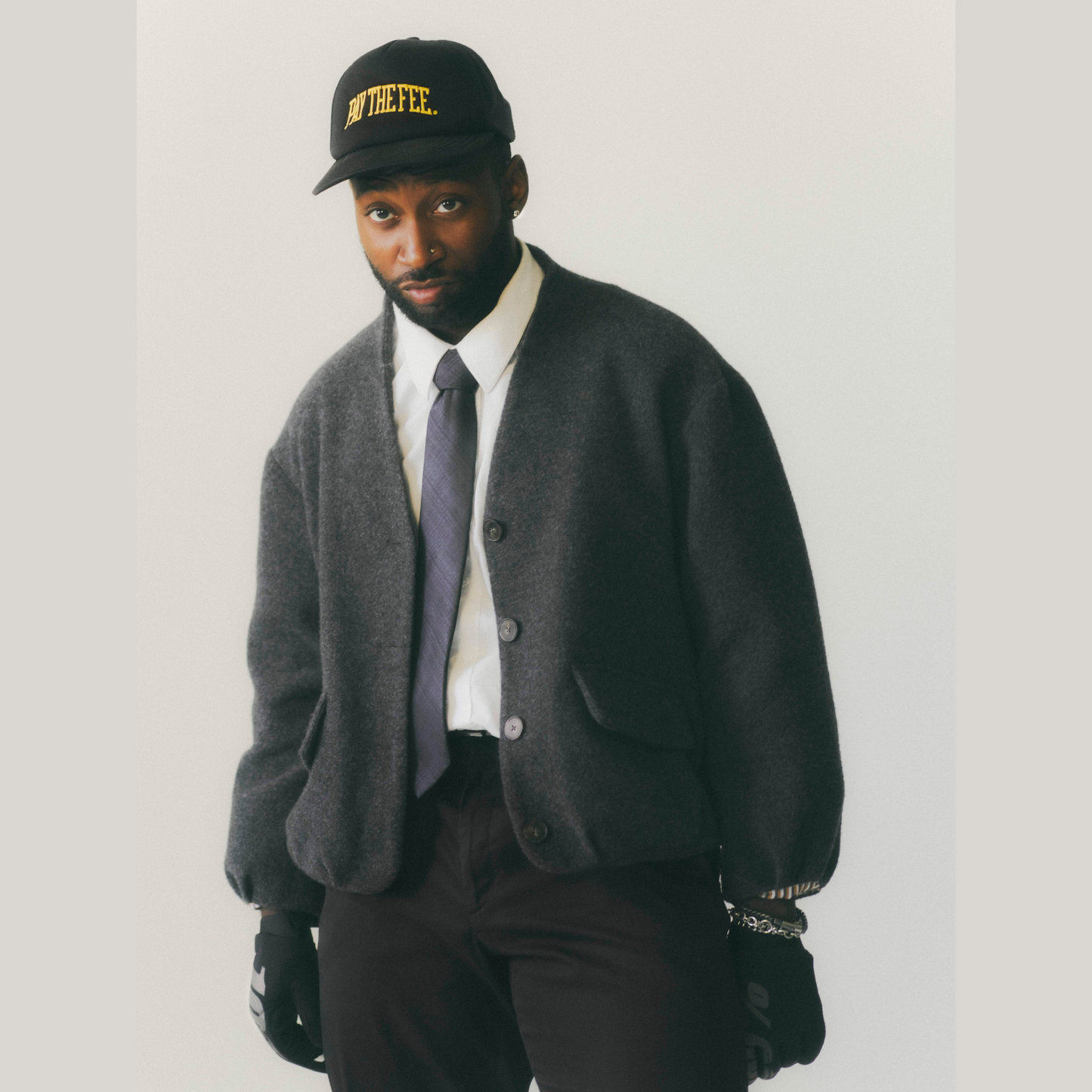 OK Coop Musician Poses in Nish Niche Jacket