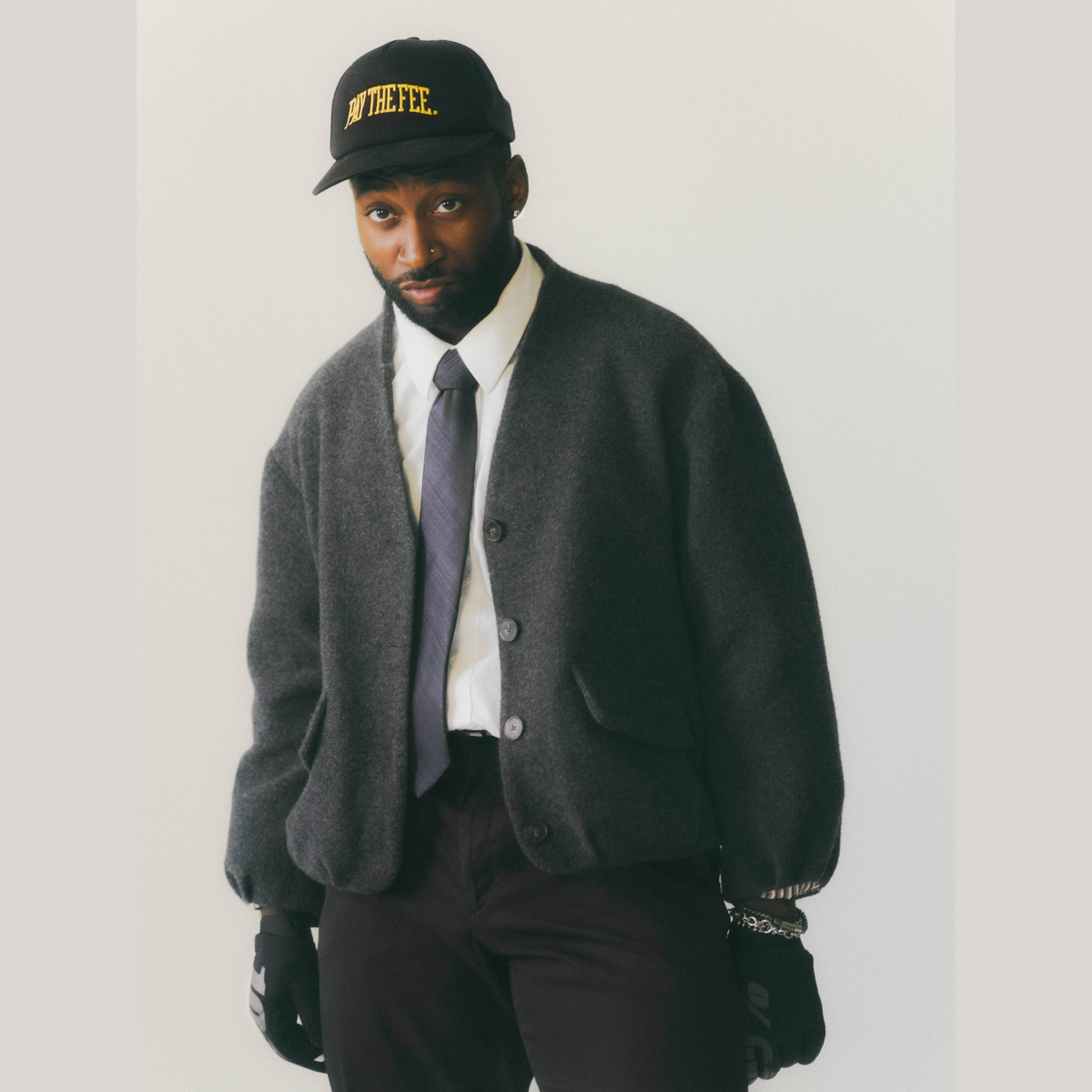 OK Coop Musician Poses in Nish Niche Jacket