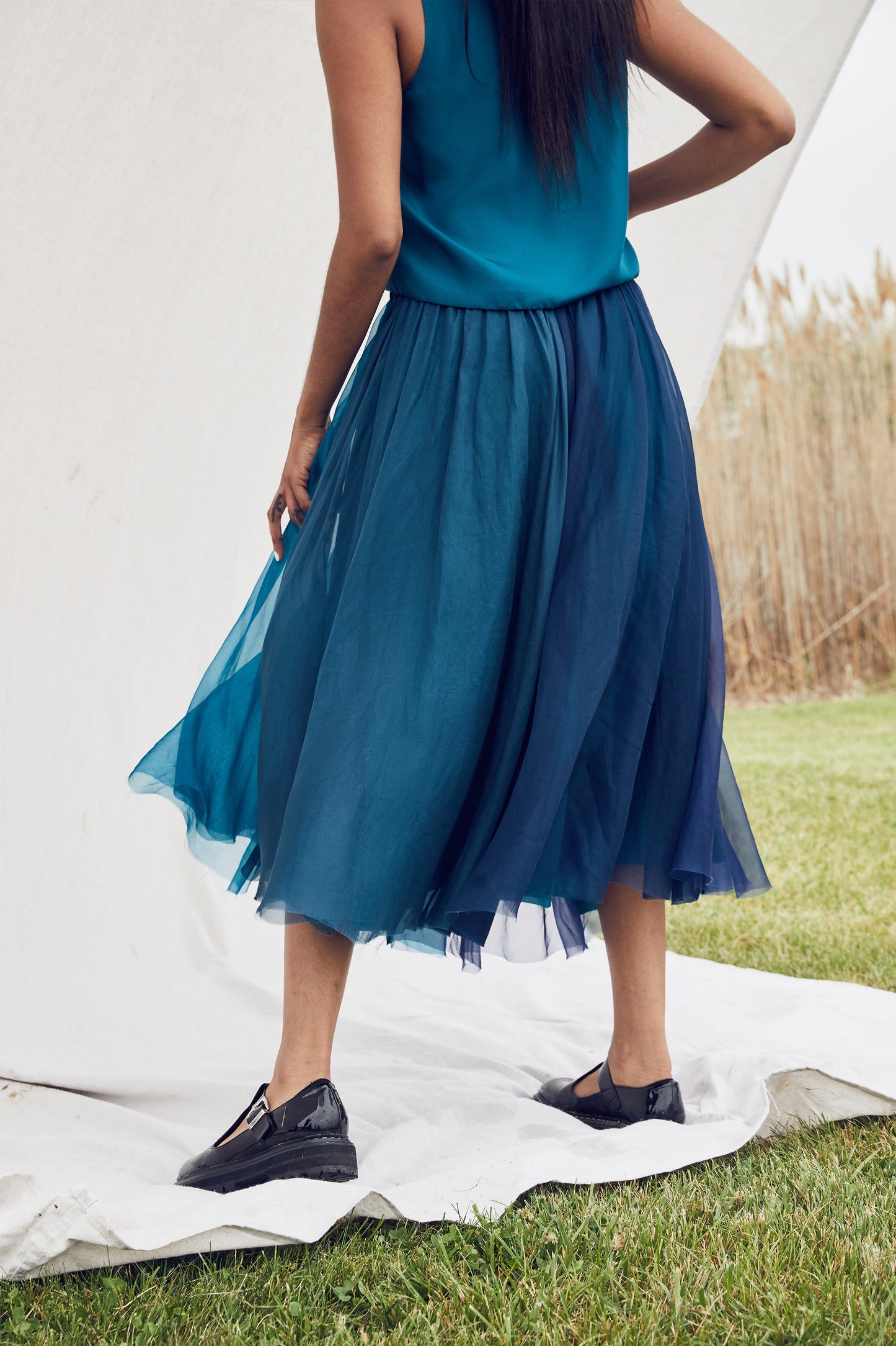 
                  
                    BLUEBELLE MOOD HAND PLISSED SILK SKIRT
                  
                