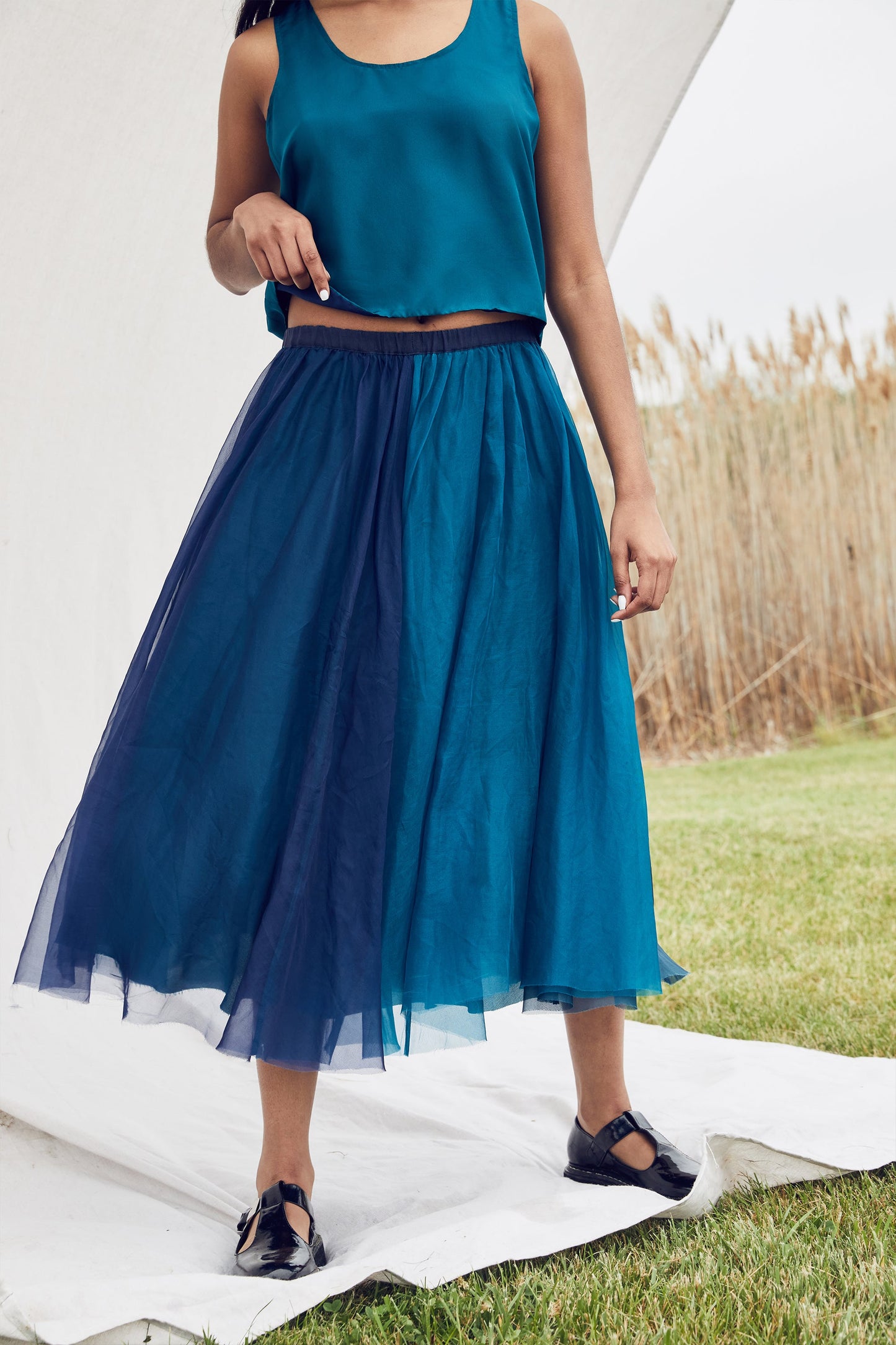 
                  
                    BLUEBELLE MOOD HAND PLISSED SILK SKIRT
                  
                