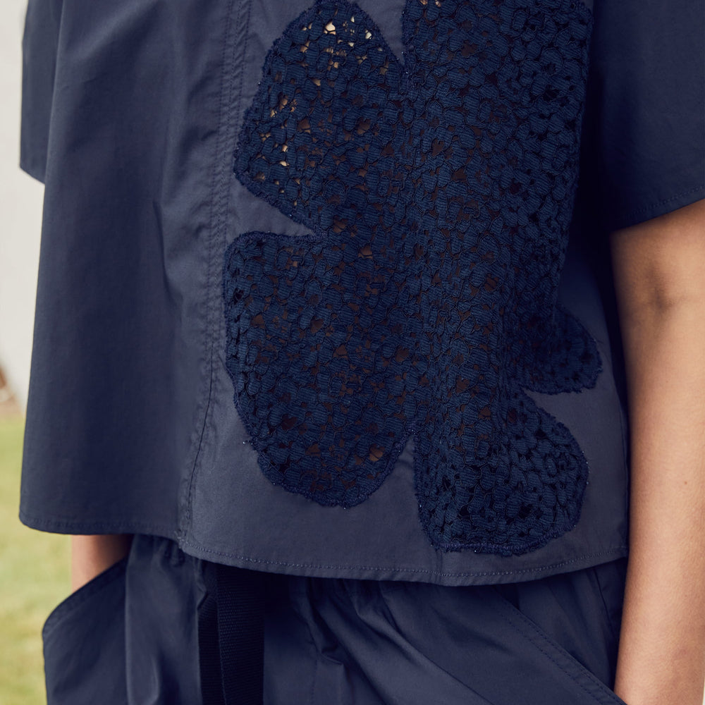 
                  
                    COSMO LACE CUT-OUT TOP
                  
                